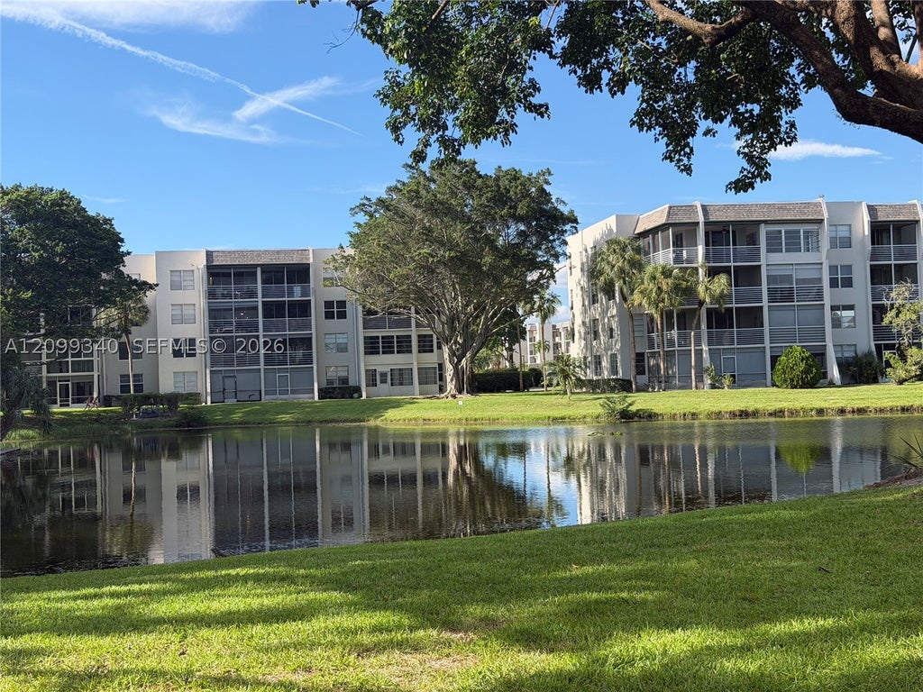 Photo of 9235 Lagoon Pl #116, Davie, FL 33324 (MLS # A12099340)