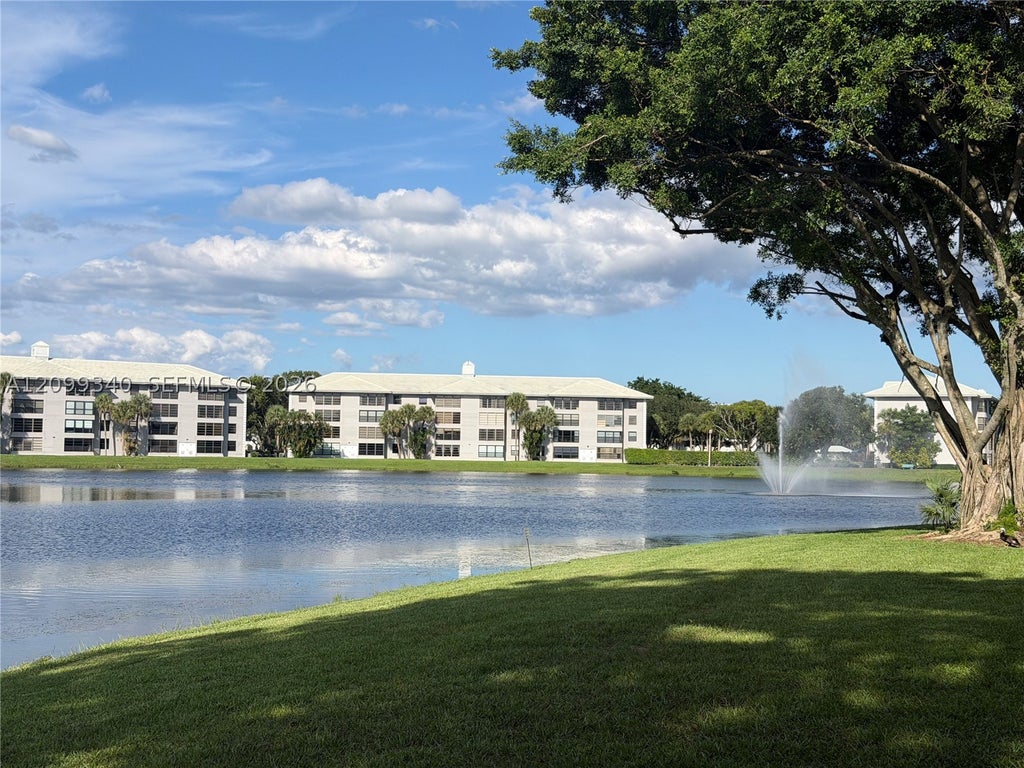 Photo of 9235 Lagoon Pl #116, Davie, FL 33324 (MLS # A12099340)
