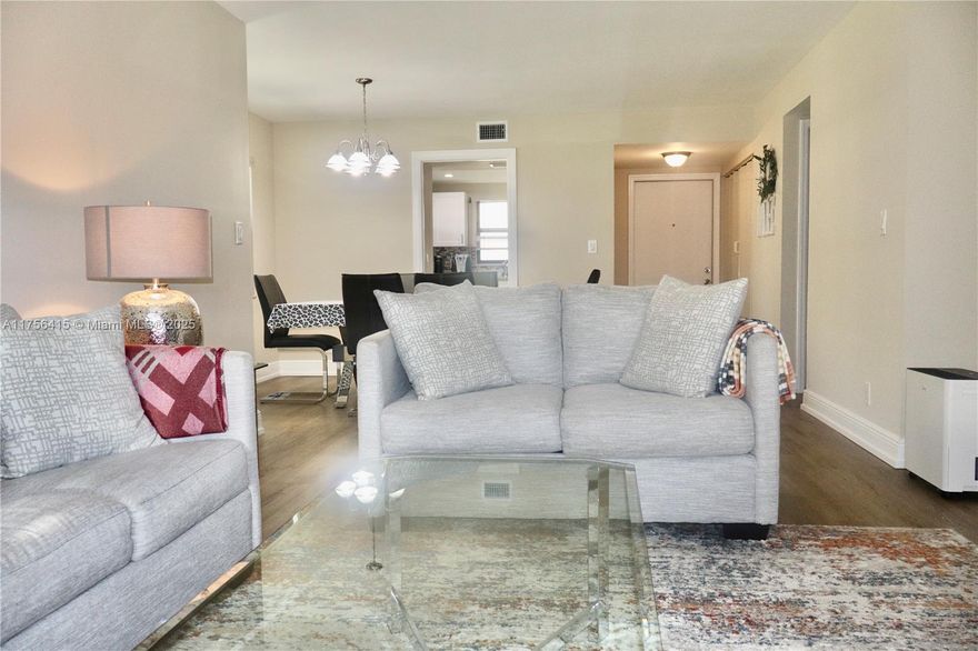 Beautifully updated fully furnished 2BR/2BA condo just 10 minutes from the beach! This move-in-ready home features new flooring, impact windows & doors and an updated kitchen with white shaker cabinets, granite countertops, and stainless-steel appliances. The primary suite offers a modern en-suite bath with a glass-enclosed walk-in shower. Enjoy serene green space views from the screened-in patio. In-unit washer/dryer, community pool, and lush landscaping. Price includes furniture! Close to shopping, dining, and major highways. Prime location—don’t miss this one! Drop ceiling recently removed from the kitchen and popcorn ceilings smoothed out.  30 year inspection complete and no current assessments. No rentals for first 2 years.