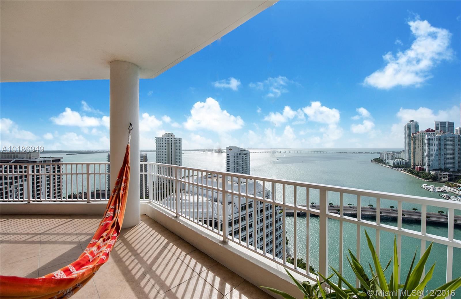 3 Bed/2.5 Bath Penthouse at Courvoisier Courts on exclusive island of Brickell Key with direct bay & ocean views. 1,655 SF of interior space & 180 SF of terrace space with direct water views. 10-foot ceilings & porcelain flooring throughout. Kitchen with Corian countertops & stainless-steel appliances & Washer/Dryer. 2 garage parking spots. LOWEST-PRICED 3-BEDROOM PENTHOUSE ON THE ENTIRE ISLAND! Amenities--swimming pool overlooking Biscayne Bay, spa, 2-level fitness center, racquetball/squash & social room. Minutes from Brickell City Centre.