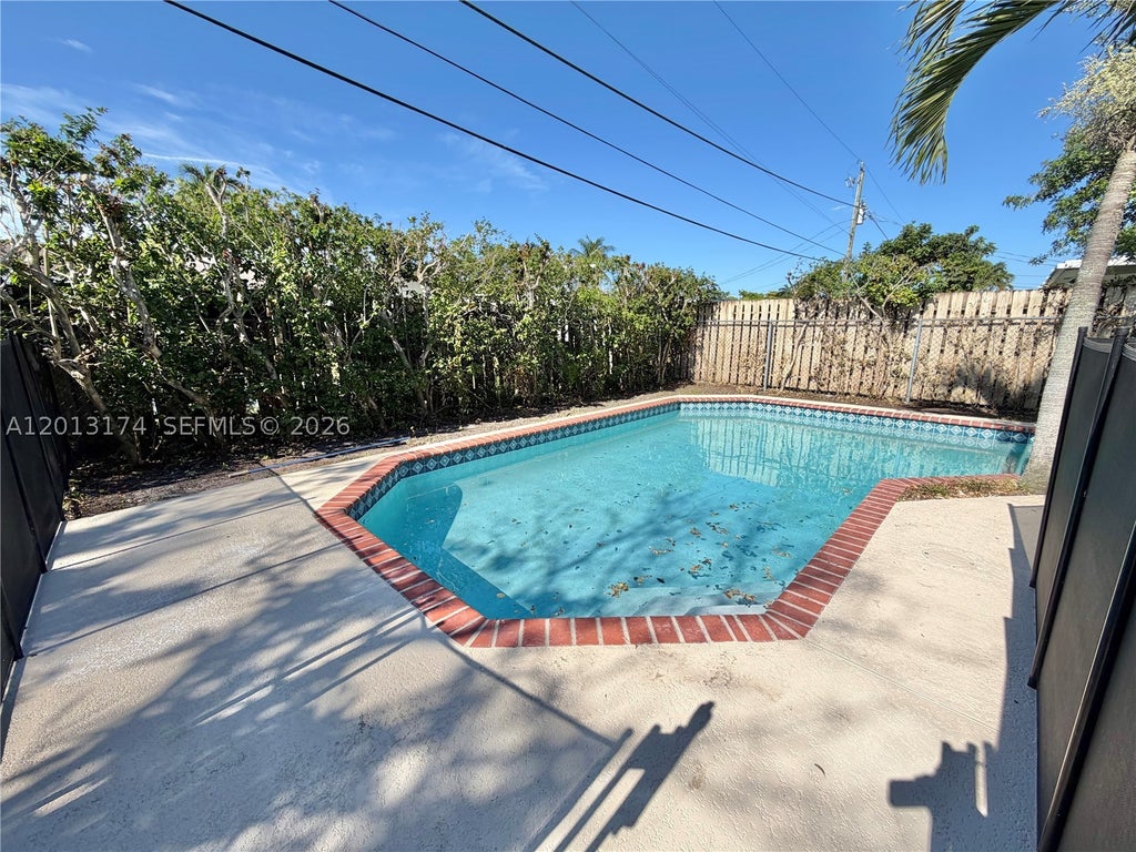 Photo of 9151 NW 21st Mnr, Sunrise, FL 33322 (MLS # A12013174)
