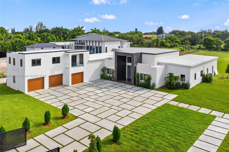 Discover a brand-new modern masterpiece in the prestigious enclave of Southwest Ranches nestled within Rolling Oaks. Set on 2.1 acres, this monumental estate combines contemporary design with resort-style living. With nearly 9,000 SF of interior space, the home offers 6 bedrooms, a private sauna, exterior gym, entertainment room, & soaring ceilings that flood the interiors w/ natural light. A 3-car garage & smartly designed floor plan provide convenience & flexibility for both family living & entertaining. The expansive pool terrace is the highlight, featuring fire pits, a built-in bar, outdoor kitchen, poolside bathroom, cold plunge, & multiple lounge areas. Crafted by Monumental Development, this estate is a true sanctuary.