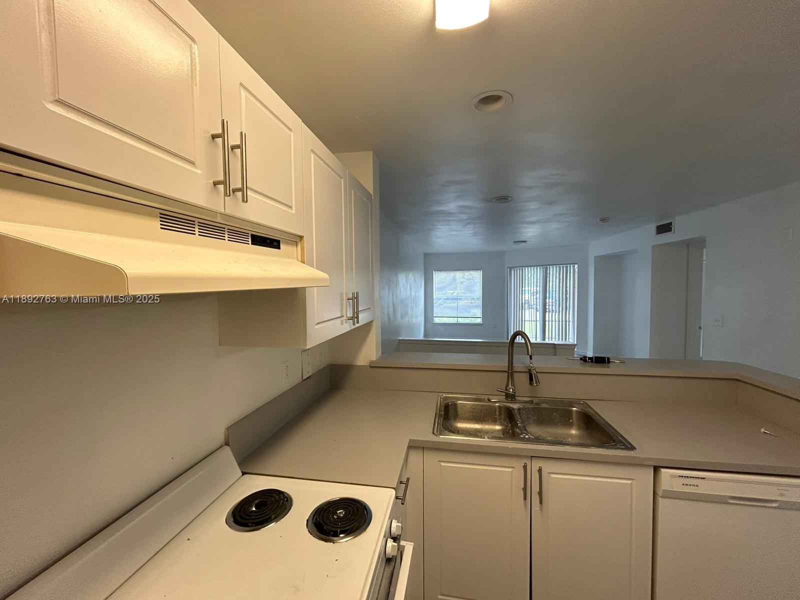 1nd Floor Unit in Gated Community, Step into this light and bright second-floor condo thoughtfully open floor plan and spacious walk-in closets for easy, modern living.Located in a gated community with amenities including a pool, fitness center, clubhouse, tennis courts beautifully landscaped walking paths.just minutes from I-95, the Turnpike, local restaurants, shopping, schools, airports & the stunning Palm Beach coastline move-in-ready condo