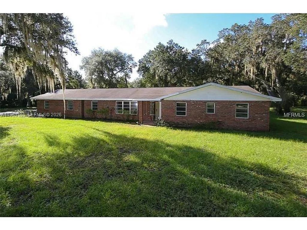 Photo of 1221 SW Stakes St, Other, FL 34266 (MLS # A11953159)