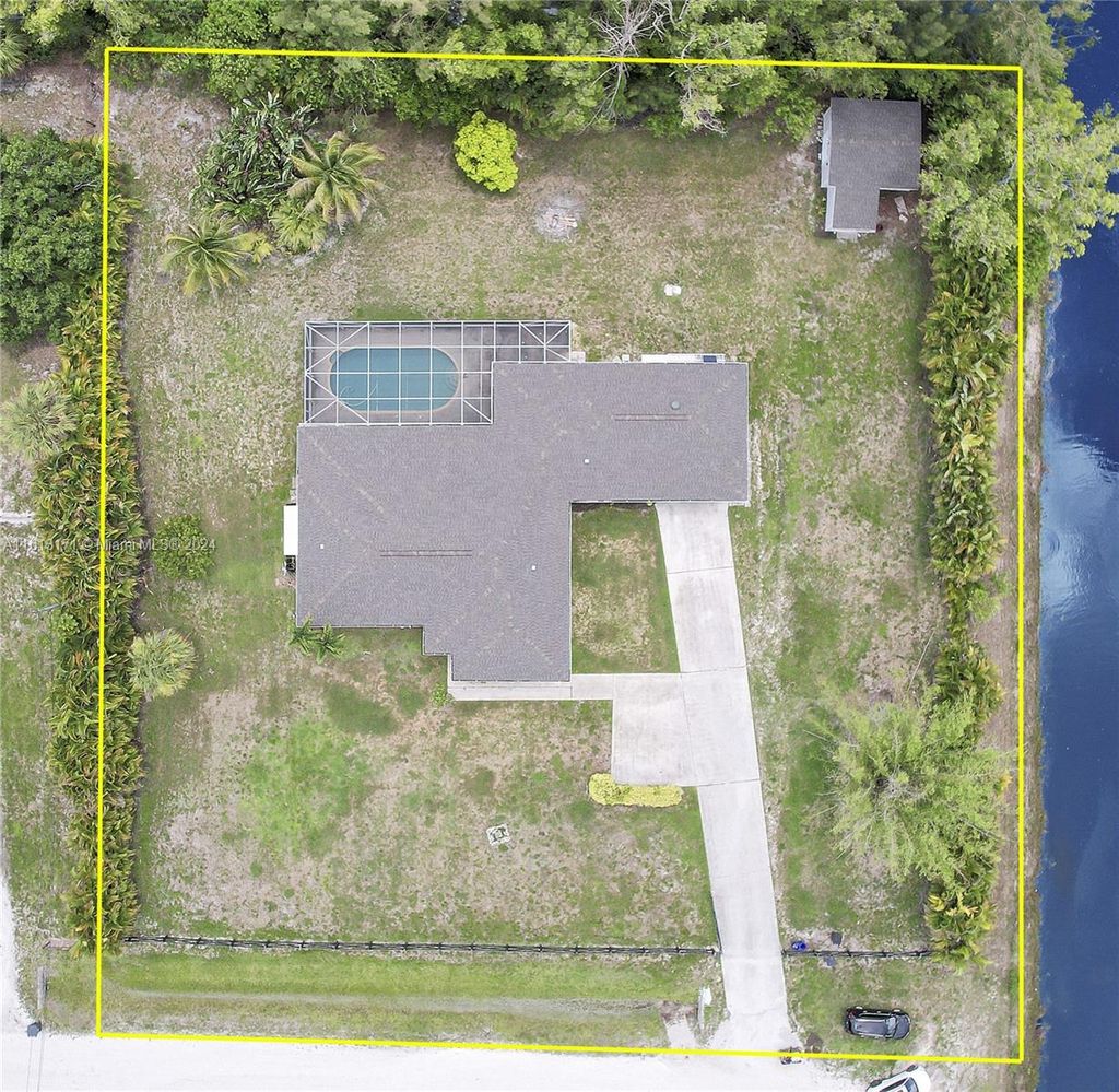 Photo of 17746 N 48th Ct N, Loxahatchee, FL 33470 (MLS # A11613171)