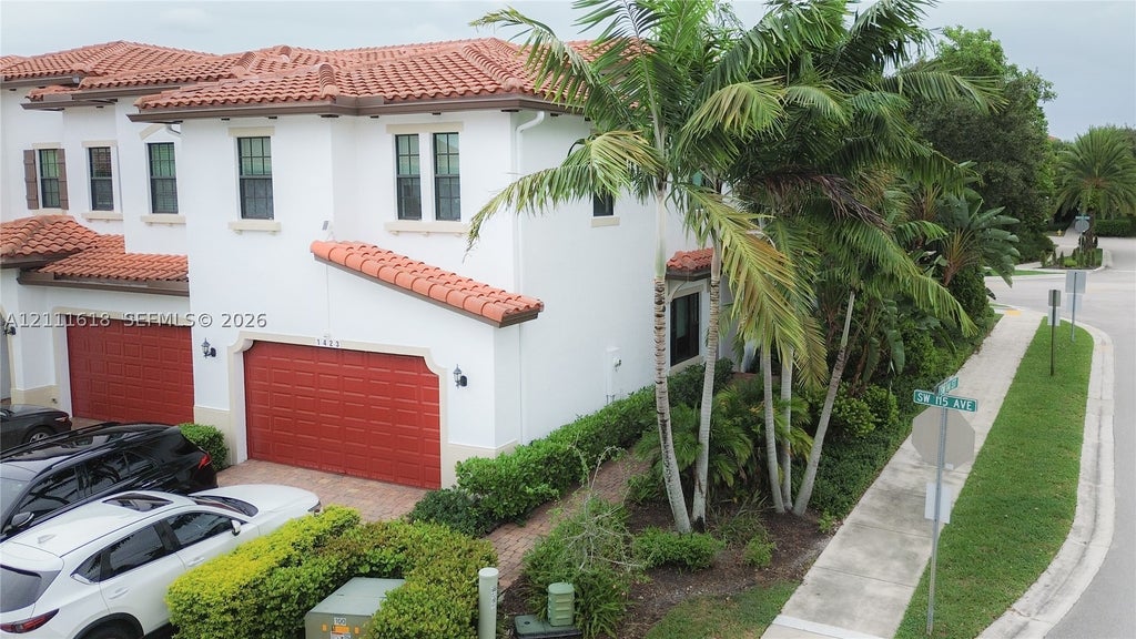 Photo of 1423 SW 115th Ave #NA, Pembroke Pines, FL 33025 (MLS # A12111618)