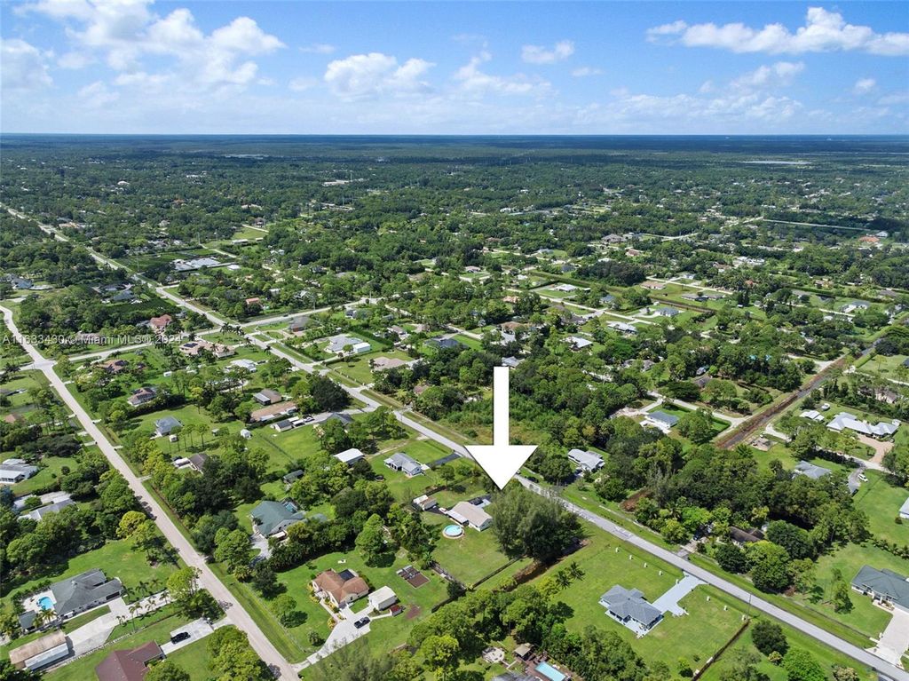 Photo of 14754 Citrus Grove Blvd, Loxahatchee, FL 33470 (MLS # A11633430)