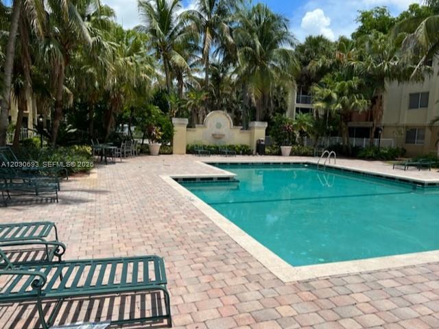 Photo of 5612 Rock Island Rd #154, Tamarac, FL 33319 (MLS # A12030693)