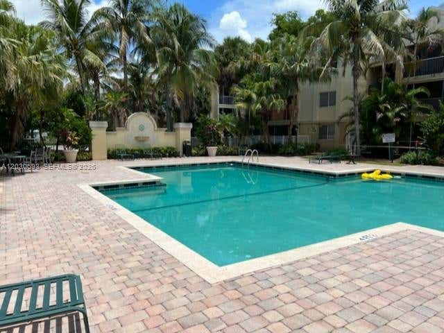 Photo of 5612 Rock Island Rd #154, Tamarac, FL 33319 (MLS # A12030693)