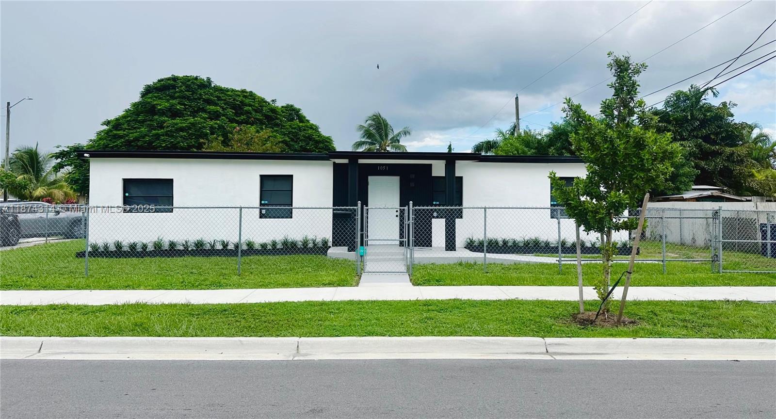 Beautiful, completely remodeled 3/2 home. New kitchen with stainless steel appliances, new bathrooms, freshly painted inside and outside.