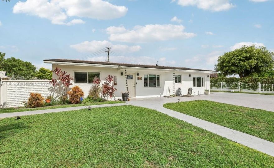 Beautifully updated 3/2 home in desirable Westchester with 1,931 sq. ft. of bright living space. Enjoy an upgraded kitchen with gas appliances and a gas stove, impact windows/doors, a recent tile roof, and a newer A/C and water heater. The primary suite includes a private en-suite bath, a rare feature in this area. A second full bath features a jetted tub. Situated on a corner lot with a fully fenced driveway and a spacious backyard perfect for outdoor living. Excellent natural light throughout, no HOA, and centrally located near top schools, Tropical Park, major highways, shopping, and dining. Prime central Miami location.