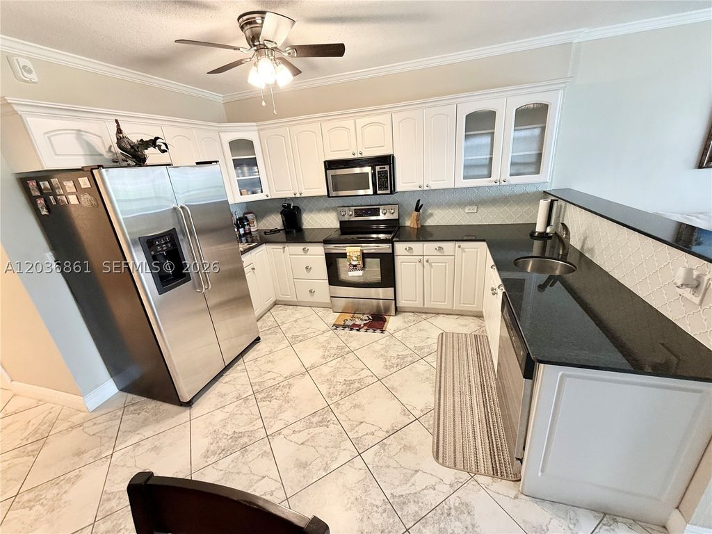 Photo of 1000 SW 12th St #201, Fort Lauderdale, FL 33315 (MLS # A12036861)
