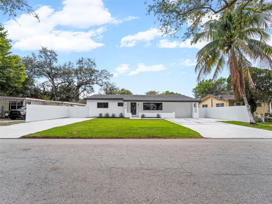 Experience luxury living in this fully renovated, like-new modern residence located just 10 minutes from Sunny Isles Beach and only 7 minutes from Aventura Mall. This one-of-a-kind property features a spacious 5-bedroom, 3-bathroom main home plus an attached 2-bedroom in-law quarters, perfect for extended family, guests, or additional income potential. Designed with elegance and functionality in mind, this home has been completely upgraded with new plumbing, electrical, and mechanical systems, along with a new flat roof that enhances its sleek contemporary design. The exterior showcases sophisticated Benjamin Moore color selections, creating exceptional curb appeal with multiple spaces for driveway parking. Inside, the designer kitchen is the centerpiece of the home, featuring stunning quartzite countertops, custom wood-grain cabinetry, flat-panel modern doors, stainless steel appliances, built in microwave, pantry, coffee/bar station with wine cooler and an oversized cooking island designed for entertaining and unforgettable gatherings. The luxurious primary suite offers a spa-inspired bathroom complete with a his-and-her vanity, oversized walk-in shower, and custom-built closet cabinetry tailored for refined living. Every detail of this home has been carefully curated to deliver comfort, style, and a premium living experience. This is truly one of the crème de la crème properties in the area — a rare opportunity that will not last.