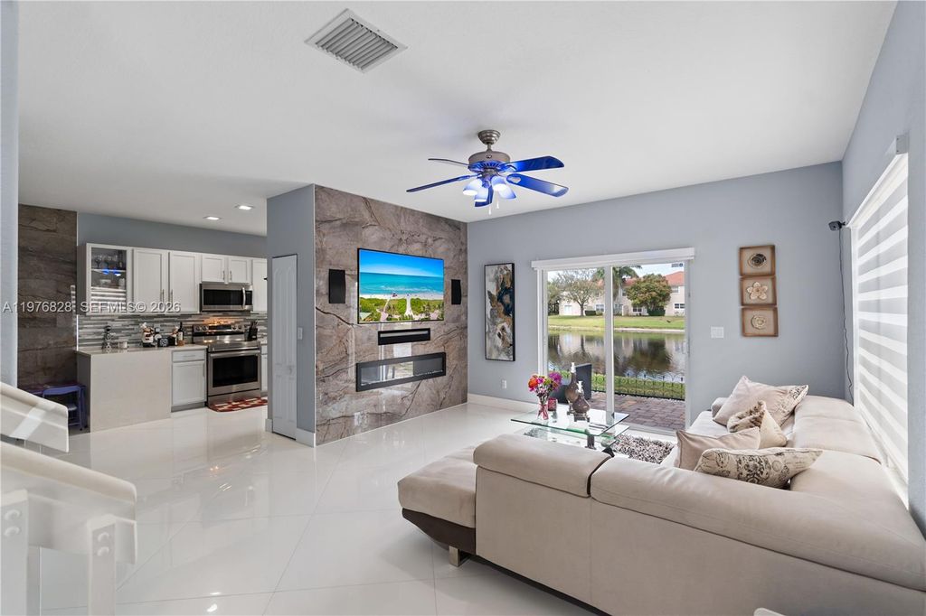 Photo of 4301 Macarthur Palm Trl, Green Acres, FL 33463 (MLS # A11976828)