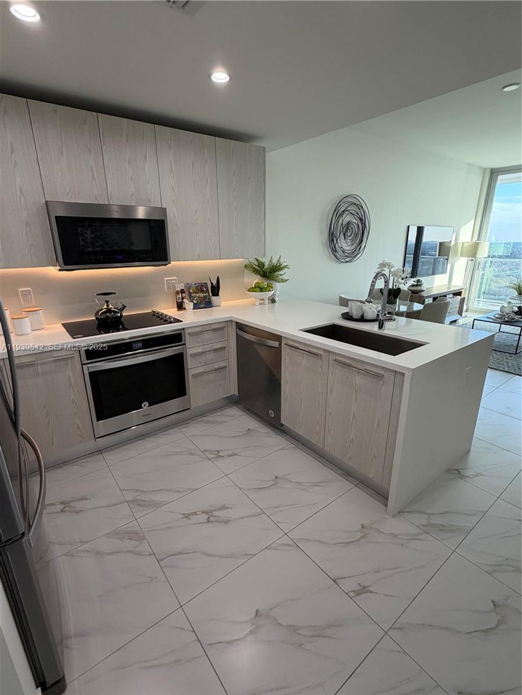 Photo of 2000 Metropica Way #2108, Sunrise, FL 33323 (MLS # A11930542)