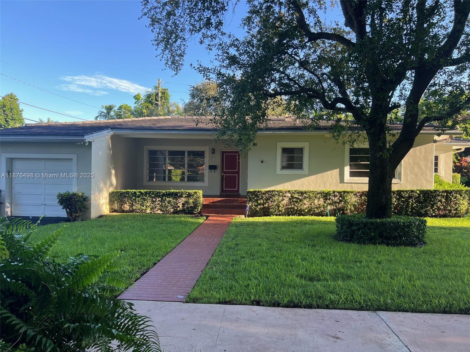 Come Home to this Mid-Century Charmer — Inviting 3-Bed, 2-Bath Coral Gables Gem on tree-lined residential street. Enjoy spacious bedrooms, a comfortable floorplan, and large picture windows that fill the home with natural light. Master bedroom features an ensuite bathroom and a large walk-in closet. Attached 1-car garage + driveway and generous yard on 11,000 SQFT lot. Located within walking distance to Merrick Park, Coral Gables Youth Center, and Coral Gables Library. Centrally positioned just minutes from Miracle Mile’s shops and restaurants, the iconic Biltmore Hotel, and the University of Miami. Miami International Airport is only a quick 15-minute drive away.