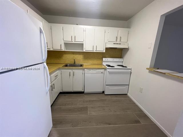 WOODSIDE APTS CONDO - Residential Lease