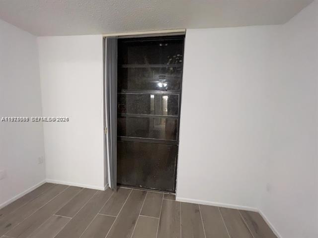 WOODSIDE APTS CONDO - Residential Lease