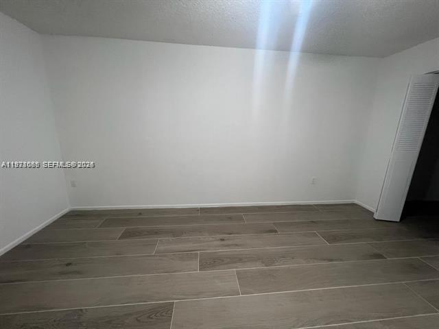 WOODSIDE APTS CONDO - Residential Lease