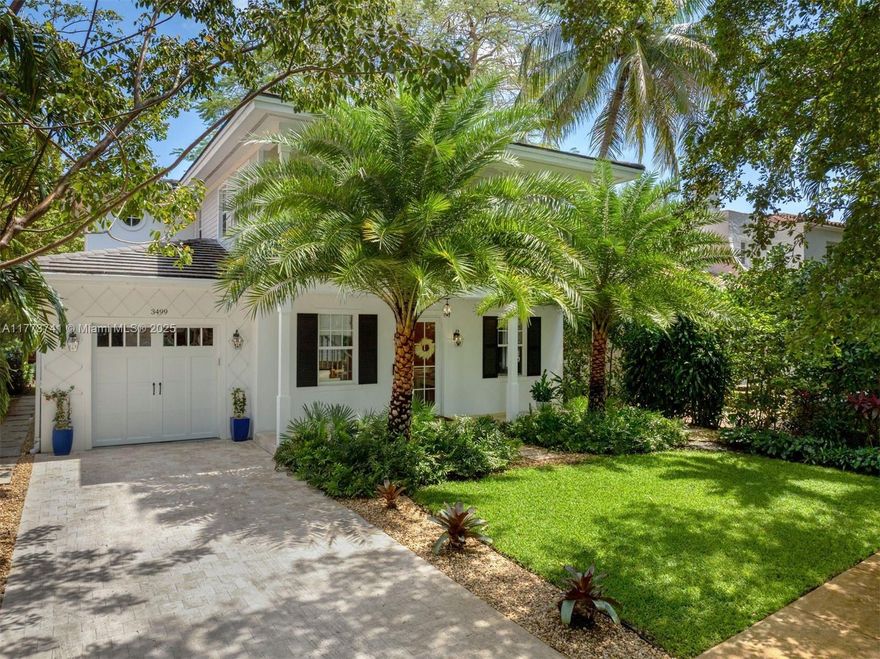 An exceptional find in the heart of Coral Gables’ Golden Triangle. This four-bedroom, four-bathroom 2020-built custom residence offers 3,194 total SF with refined finishes and thoughtful design. Enjoy lush tropical landscaping, a sparkling saltwater heated pool, and expansive outdoor living with a covered terrace, built-in Coyote grill, beverage fridge, and retractable awning. Elegant interiors feature porcelain tile floors, textured wall treatments, Sonos system, Nest thermostats, and a custom eat-in kitchen with quartz countertops and premium Kitchen Aid appliances. High-impact windows, Tesla EV charger, epoxy-finished garage, and flat tile roof complete this standout home, just moments from the Biltmore, Miracle Mile, and more.