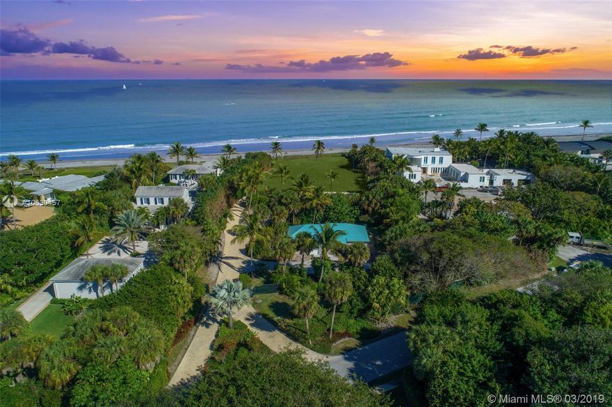 JUPITER ISLAND OCEANFRONT~ Be Prepared to FALL IN LOVE with this one of a kind Oceanfront Estate boasting 144 Feet of Direct Frontage on the OCEAN and 1.50 Acres of land. This ''PERFECT'' size property is located at one of the best stretches of BEACH for Jupiter Island, sitting up HIGH with EXCELLENT ELEVATION AND A SLOPING GREEN LAWN down to the beach with immediate sand for the best of all that Jupiter Island has to offer..Located approximately halfway between Jupiter and Hobe Sound. This parcel is being sold with a full set of JUST FINISHED architectural plans for an 8500 total sq ft single family home with detached guest house/Garage/Infinity Pool. The plans are simply stunning and accentuate a COMPLETE OPEN FLOOR PLAN with an UNOBSTRUCTED view through the wall glass sliders beyond the