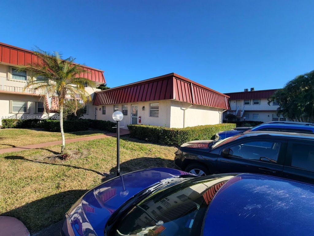 Photo of 12016 S Greenway Cir S #108, Royal Palm Beach, FL 33411 (MLS # A11961613)