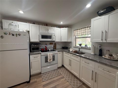 Photo of 9581 Sunrise Lakes Blvd #101, Sunrise, FL 33322 (MLS # A11869596)