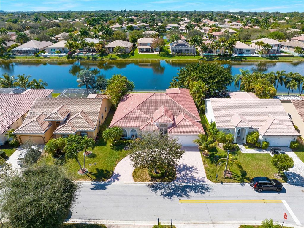 Photo of 5354 NW 57th Way, Coral Springs, FL 33067 (MLS # A11963031)