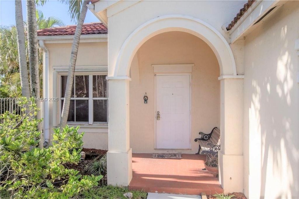 Photo of 777 Tanglewood Cir, Weston, FL 33327 (MLS # A12003240)