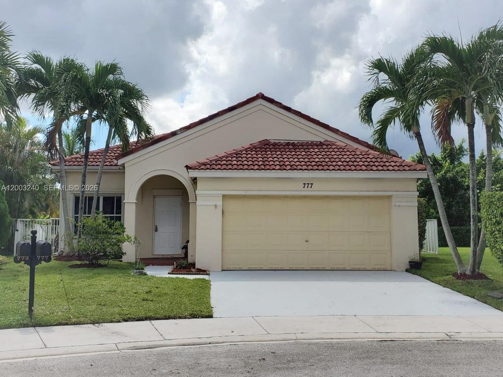 Photo of 777 Tanglewood Cir, Weston, FL 33327 (MLS # A12003240)