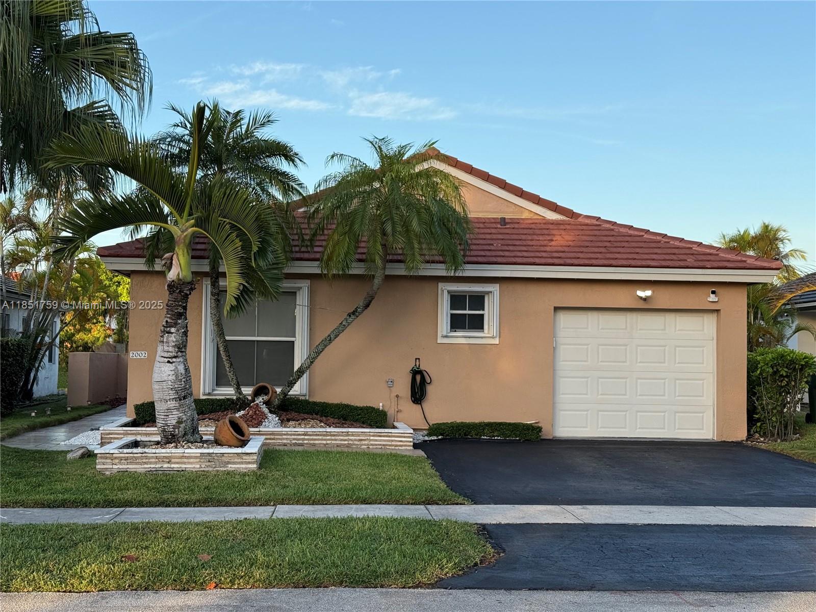 Updated, lakefront oasis in the highly sought-after Chapel Trail! This pristine one-story home offers serene water views from the moment you step inside and from the primary suite. The high vaulted ceiling and open chef's kitchen, dining options and living room flow into your screened-in patio providing a tranquil sanctuary to enjoy morning coffee or breathtaking sunsets over the lake. The light-filled layout is perfect for both relaxing and entertaining, creating the ultimate indoor-outdoor Florida lifestyle. Don't miss the chance to make this tranquil waterfront retreat your forever home. A-rated schools, amenities, and a low HOA. Roof 2016, AC 2010, 360 view cameras, accordian shutters, tankless water-heater 2016, water-filtration system.