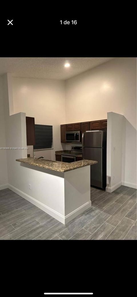 Photo of 3600 NW 83rd Ln, Sunrise, FL 33351 (MLS # A11903935)