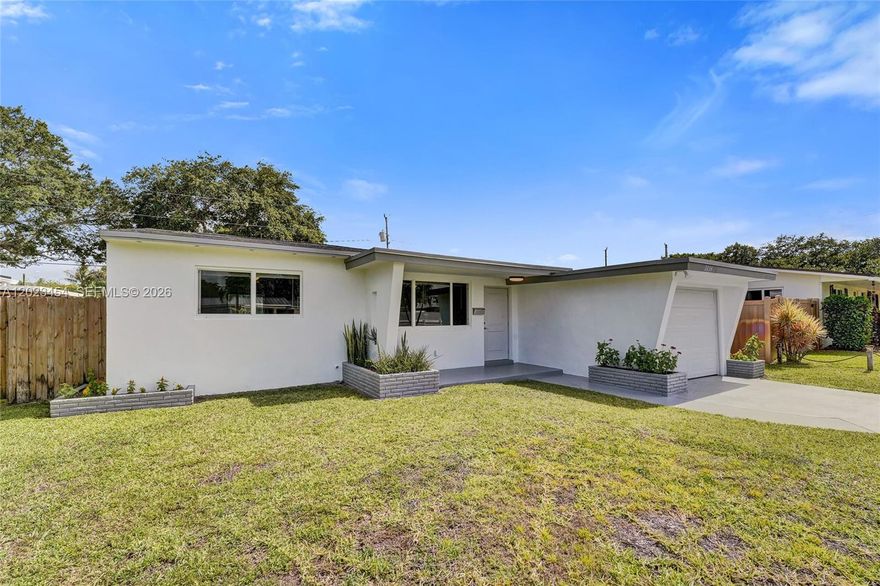 Renovated home in immaculate, move in ready condition. NEW A/C, electrical panel, hurricane impact windows & doors, & a NEWER permitted ROOF, offering peace of mind with the home’s major improvements already completed. Plumbing was updated in 2020, & the home has freshly been painted both interior & exterior. Filled with abundant natural light, the interior offers an airy feel with numerous windows & consistent flooring throughout. Modern renovated bathrooms & a beautifully updated kitchen are complemented by newer stainless steel appliances. Separate laundry room with additional storage space.  A newly installed privacy fence enhances  the large backyard, creating a secluded outdoor setting ideal for entertaining, with ample room for a pool. The spacious lot also accommodate a boats, trailers, or additional vehicles. Ideally located near shopping, dining, entertainment, & everyday conveniences. Just 15 minutes to Hollywood Beach, Seminole Hard Rock Hotel & Casino Hollywood, & The Fort pickleball, & only 10 minutes to Dania Pointe. Grocery stores, Target, & the YMCA of South Florida are all within a mile. Come experience all this home has to offer & make it your own slice of paradise.