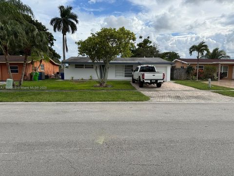 Photo of 8600 NW 27th Pl, Sunrise, FL 33322 (MLS # A11896926)