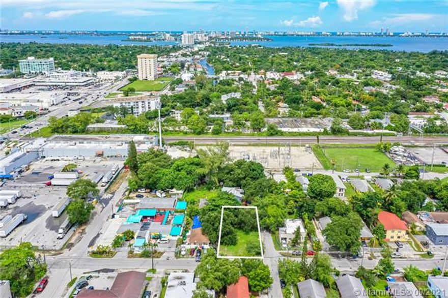 Located in Miami's hottest "Opportunity Zone"! Nestled between the booming "Upper East Side", and the re-emerging 79th street corridor, this vacant 6,000 sq ft lot zoned for T5-R is surrounded by multiple neighborhoods undergoing a tremendous amount of growth, expansion, and opportunity. The site is located less than six miles north of the bustling downtown Miami development scene and adjacent to trendy MiMo District, world renowned mixed-use Wynwood, Midtown, and Upper Eastside neighborhoods. Escape the city with a short 5 min drive to North Bay Village and 10 minutes to Miami's white sand beaches. **Click on virtual tour to watch youtube video of the property surroundings.