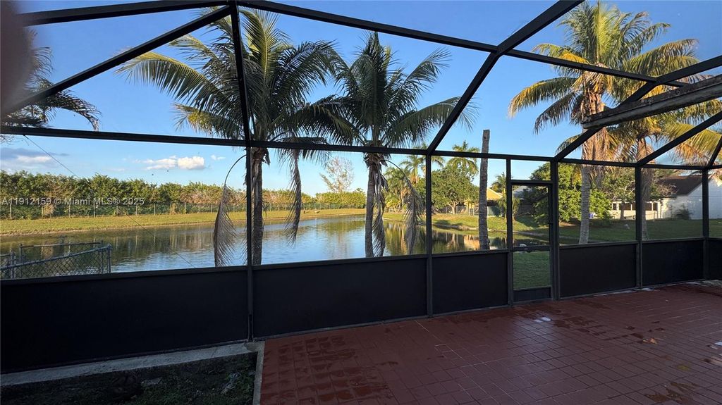 Photo of 1111 SW 84th Ter, Pembroke Pines, FL 33025 (MLS # A11912159)