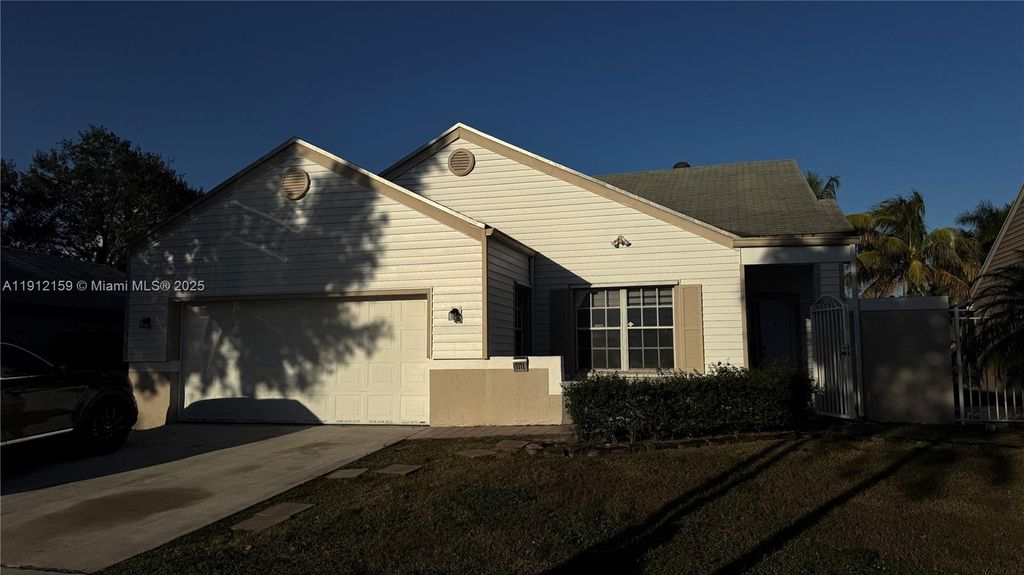 Photo of 1111 SW 84th Ter, Pembroke Pines, FL 33025 (MLS # A11912159)