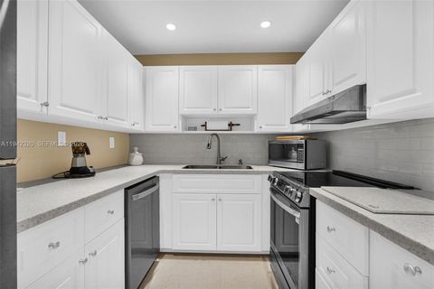 Photo of 5911 NE 14th Ln #301S, Fort Lauderdale, FL 33334 (MLS # A11942320)