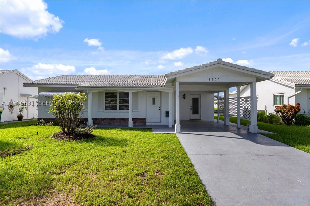 Photo of 8300 NW 59th Street, Tamarac, FL 33321 (MLS # A12096631)