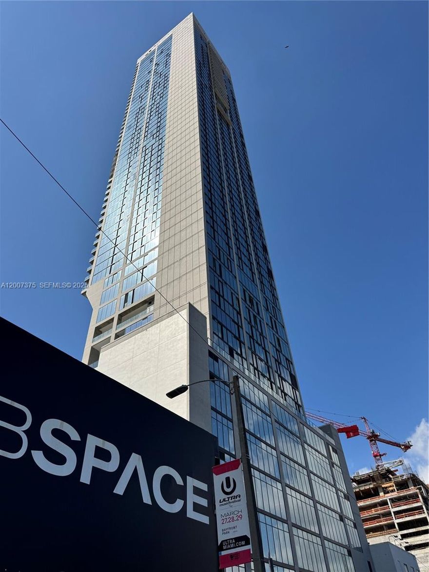 Brand new studio at E11EVEN Hotel & Residences, one of Downtown Miami's most prestigious addresses in the Park West District. Fully furnished and finished hotel-turnkey by E11EVEN — delivered move-in ready with Sub-Zero and Wolf appliances and interiors curated by award-winning design firm AvroKO Hospitality Group. The building offers an exceptional amenity package: a 20,000 sq ft pool deck and day club, state-of-the-art fitness center, Chopra Spa & Studio, rooftop pool with dining, gourmet food hall, casino-style sports lounge, valet, and 24/7 concierge services accessible via app. The owner has multiple adjacent units available on the same floor — for sale or rent — with sunrise views of Downtown Miami and Biscayne Bay or west-facing sunset views with all-day natural light.