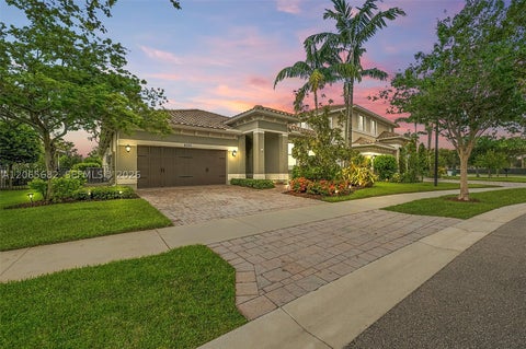 Photo of 8550 Lakeside Bnd, Parkland, FL 33076 (MLS # A12065682)