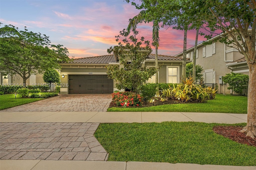 Photo of 8550 Lakeside Bnd, Parkland, FL 33076 (MLS # A12065682)