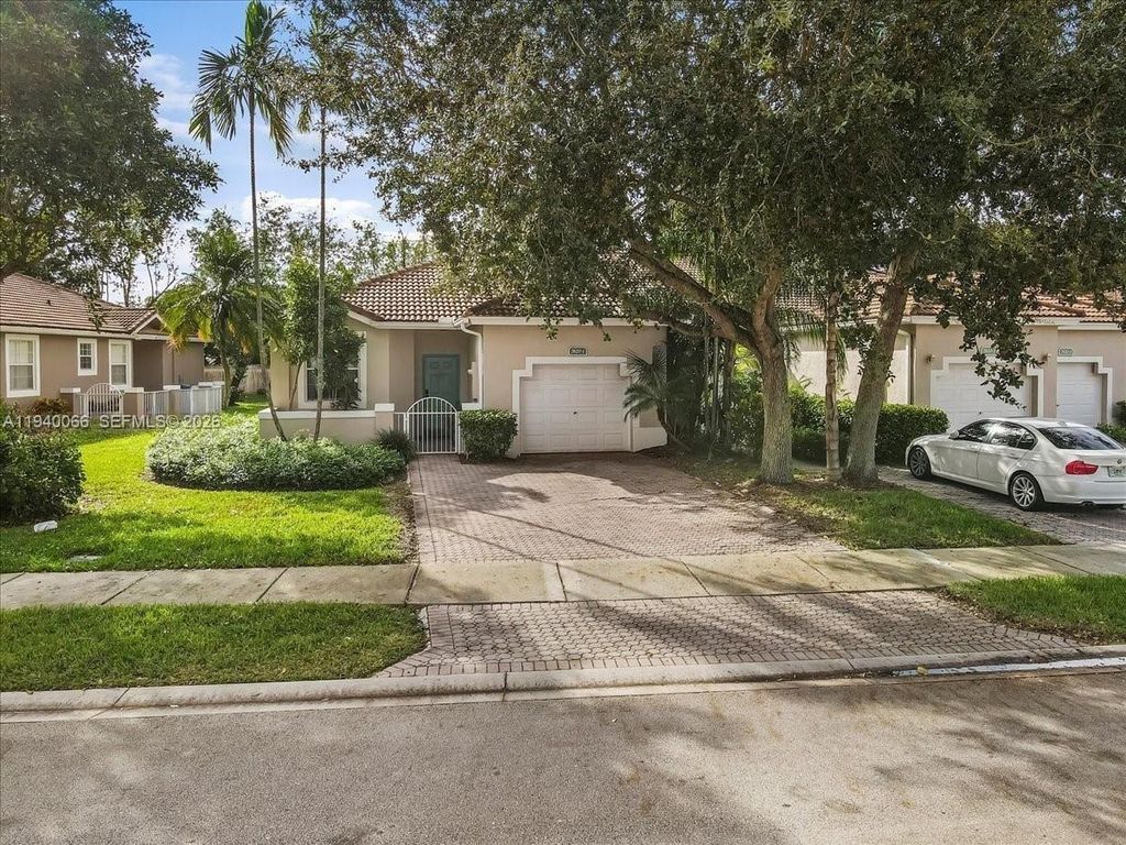 Photo of 7620 S Aragon Blvd #1, Sunrise, FL 33322 (MLS # A11940066)