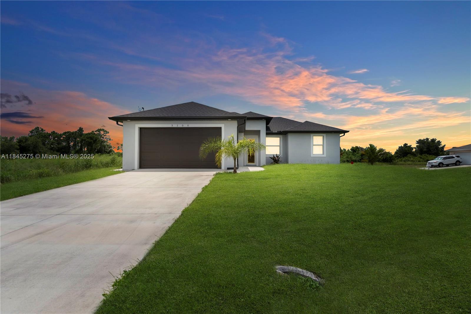 Single-family home located outside the flood zone and free of HOA restrictions, featuring 3 spacious bedrooms, 2 full bathrooms, a bright open-concept layout with living, dining, and a modern kitchen, plus a private backyard ideal for outdoor enjoyment. An additional enclosed area within the garage includes a private entrance, full bathroom, and kitchen setup, offering flexible use as a personal retreat or workspace. A great opportunity to own a modern home with functional space and versatility.