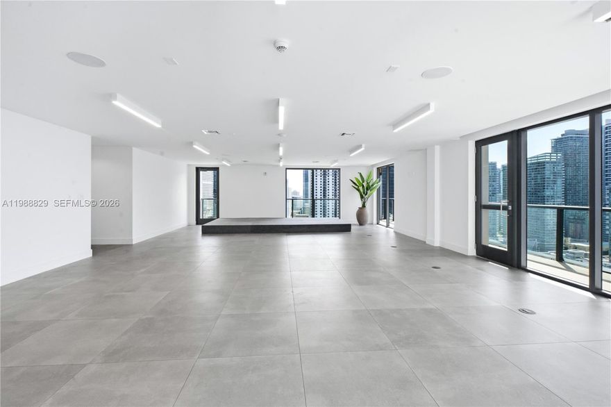 Unique opportunity to acquire a premium commercial rooftop space in the heart of Brickell, located within the Smart Brickell development. This exceptional asset features modern finishes, floor-to-ceiling glass, expansive terraces, and panoramic skyline views—ideal for hospitality, event, or upscale commercial concepts.
Rooftop commercial spaces in Miami are extremely limited, making this a rare opportunity to secure a unique asset with strong long-term value and positioning.
The 24th floor offers 2,189 SF of interior AC space plus 400 SF of terrace space, creating an elegant indoor-outdoor environment ideal for events, lounge concepts, or private gatherings. The 25th floor features 880 SF of interior AC space and an expansive 1,728 SF rooftop terrace with panoramic skyline views, ideal for a bar, hospitality venue, or rooftop lounge.
Combined, the property offers a total of 3,069 SF of AC interior space and 2,128 SF of terrace space, providing a unique multi-level rooftop experience rarely available in the Miami market.
The property is currently leased for a 1year term, providing immediate income while maintaining flexibility for an end user or investor. Ownership may negotiate an early tenant termination if the buyer prefers to take the space vacant.
Located just steps from Brickell City Centre, Mary Brickell Village, and major transportation corridors, this location benefits from strong pedestrian traffic and continued growth in Miami’s premier financial district.