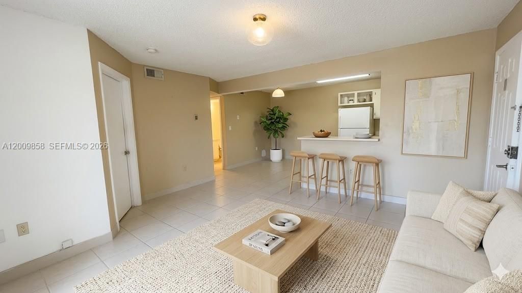 Photo of 250 W Palm Cir W #204, Pembroke Pines, FL 33025 (MLS # A12009858)