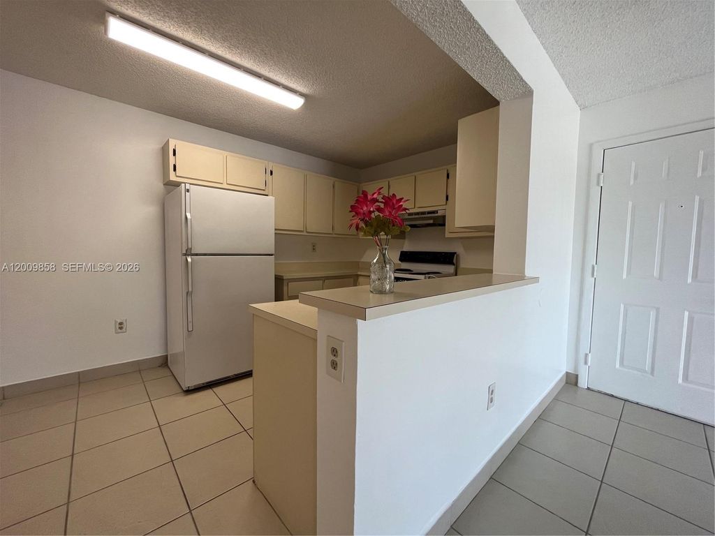 Photo of 250 W Palm Cir W #204, Pembroke Pines, FL 33025 (MLS # A12009858)