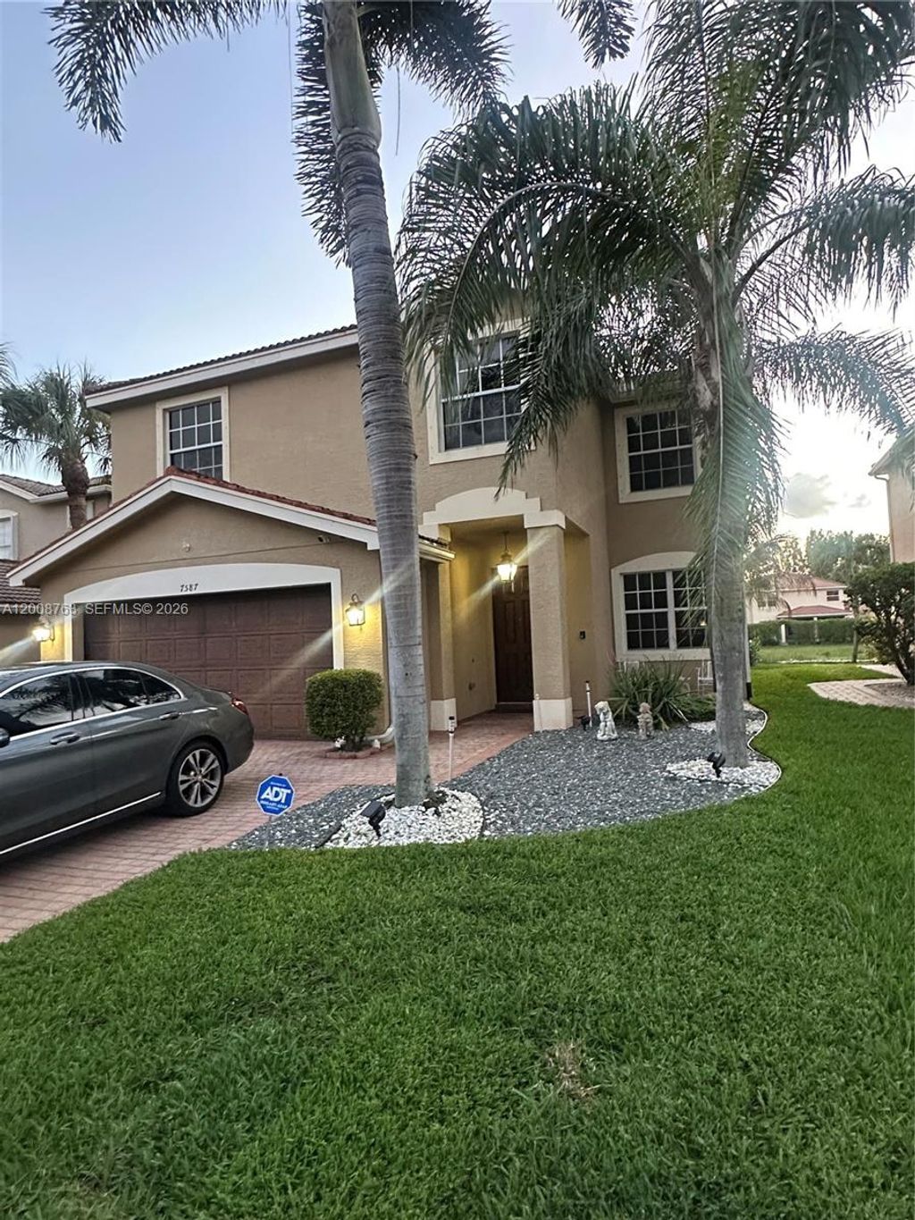 Photo of 7587 Topiary Ave, Boynton Beach, FL 33437 (MLS # A12008763)