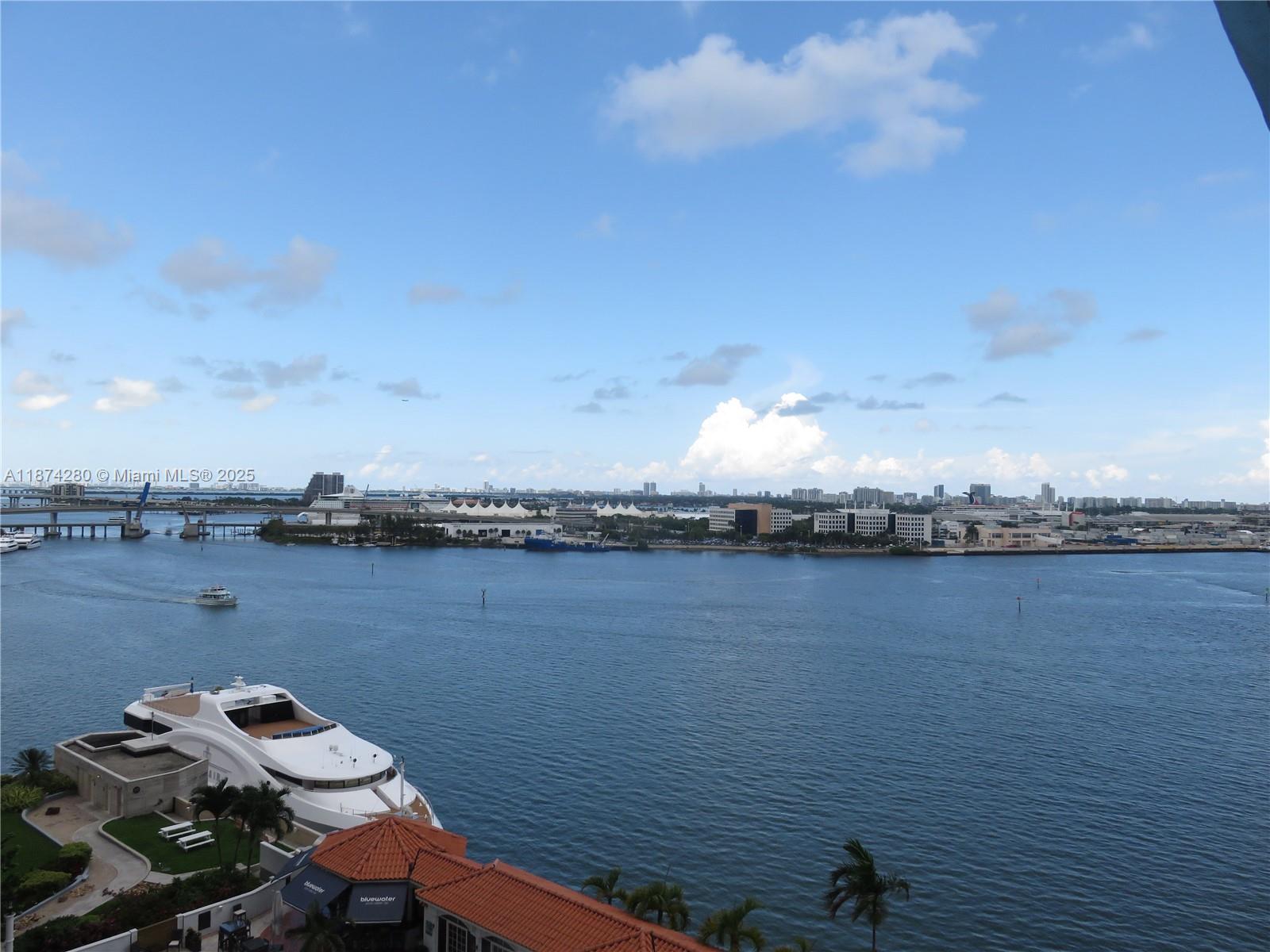 Beautiful 2 bedrooms 2 baths condo with marble floors and views of Biscayne Bay and Miami Skyline. Unit comes with Italian kitchen cabinets, granite countertops, and marble counter baths. Building amenities includes: 2 swimming pools, Jacuzzi, 2 Fitness Centers, 2 Party Rooms, Sauna, Conf. Rm., Convenience Store, and 24 hrs Security, Valet, and Concierge. Centrally located within minutes to SoBe, Grove, Gables, Design District and Airport.