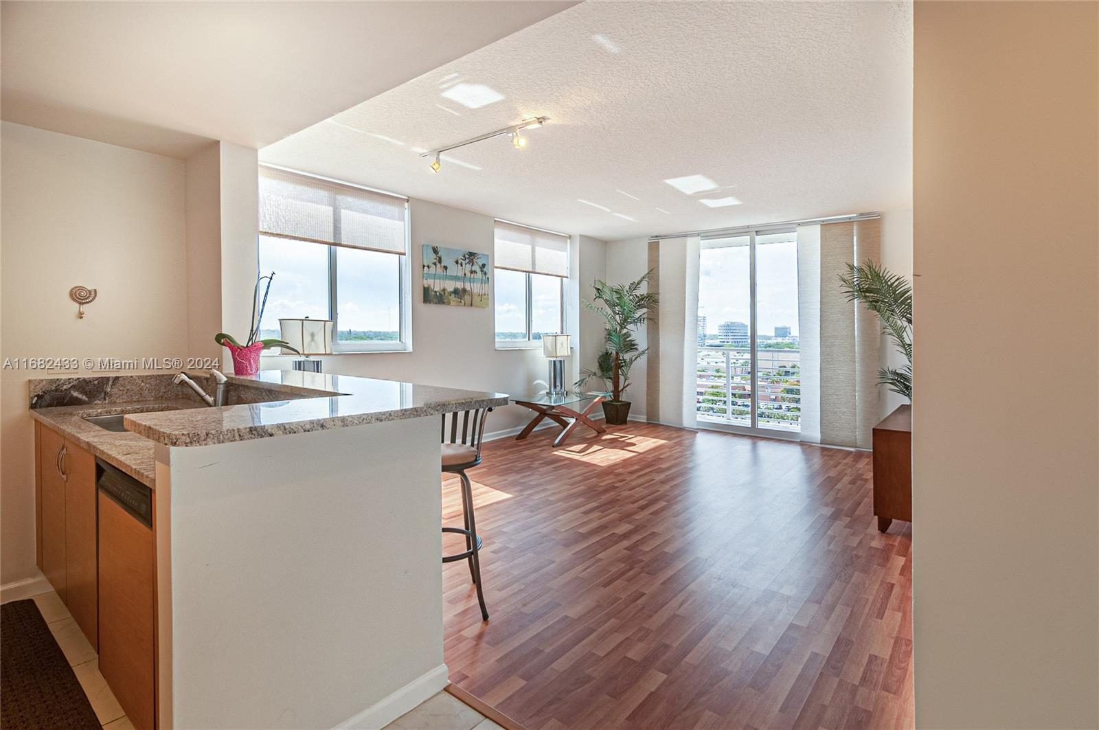 Gorgeous 1/1 corner unit with extra windows in the heart of Aventura. Renovated, Wood Floors. Enjoy this open floorplan with the oversized wraparound balcony and built-out walk-in-closet. Top of the line fitness center, sauna, pool.
